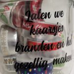 pot met theelichtjes met een kerst-boodschap